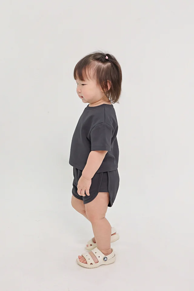 HOMEBODY LOUNGE CURVED HEM SHORTS (GUNMETAL) - MINI GIRL