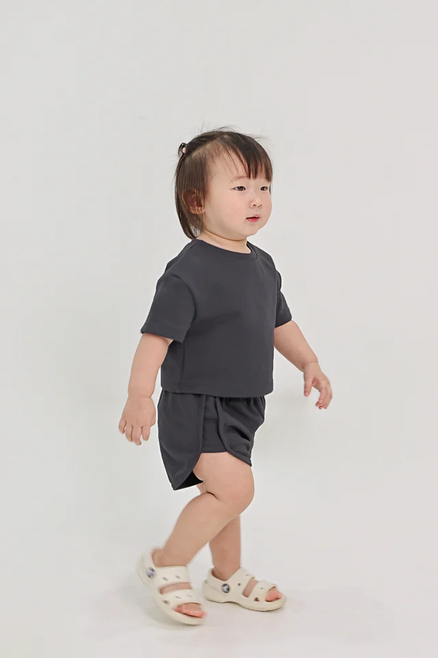 HOMEBODY LOUNGE CURVED HEM SHORTS (GUNMETAL) - MINI GIRL