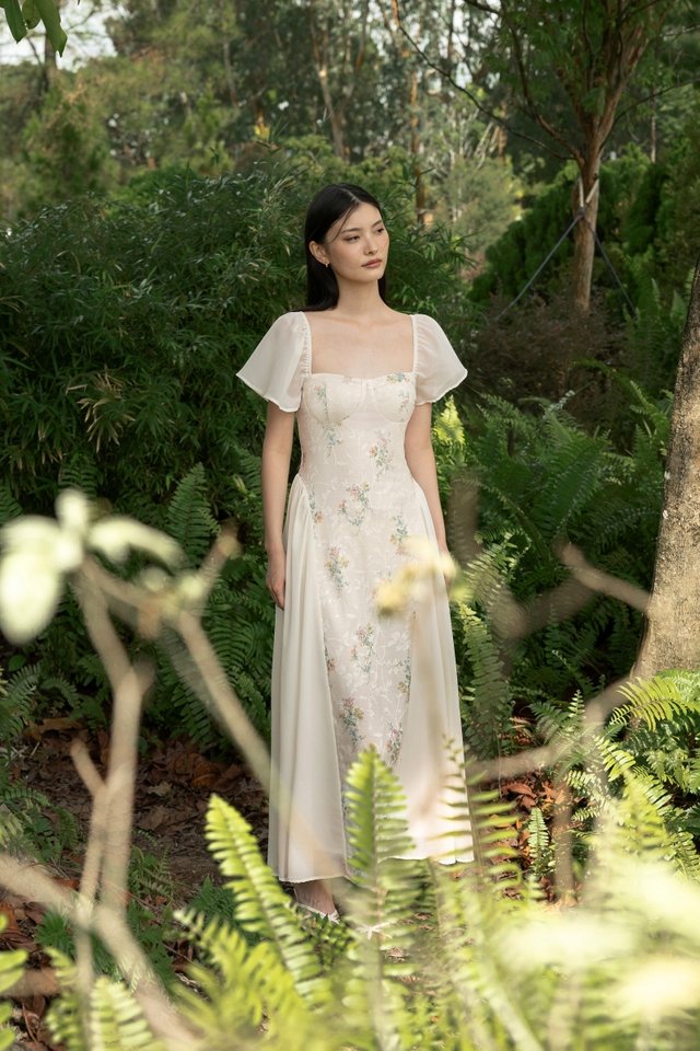 CORINNE PADDED FLORAL CONTRAST BASQUE WAIST FLUTTER SLEEVE MIDAXI DRESS