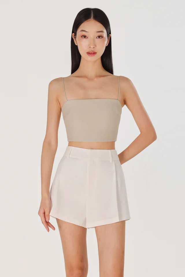 CAYLIN PLEATED FLARE SLANT HEM SHORTS (WHITE)