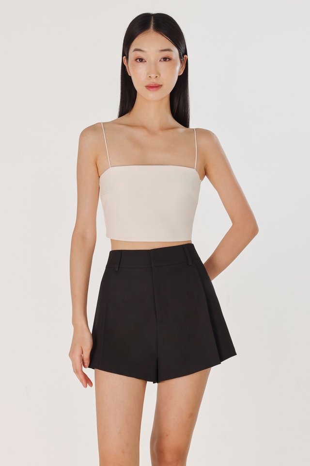 CAYLIN PLEATED FLARE SLANT HEM SHORTS (BLACK)