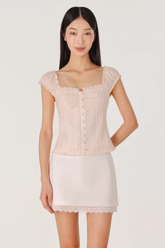 AVARA PADDED RUFFLE TRIM BUTTON TOP (OAT)