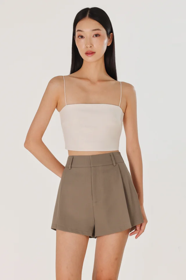CAYLIN PLEATED FLARE SLANT HEM SHORTS (BROWN)